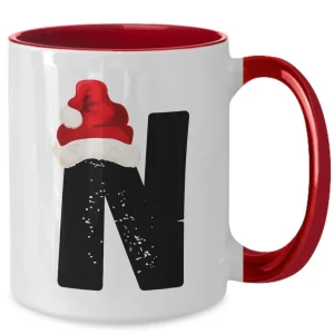 Monogram Letter “N” Christmas Coffee Mug with Christmas Hat On by Coni Blau