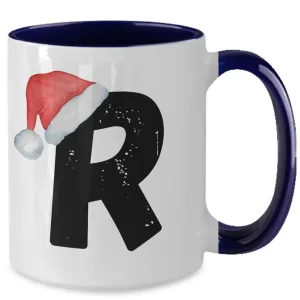 Monogram Letter “R” Christmas Coffee Mug with Christmas Hat On by Coni Blau
